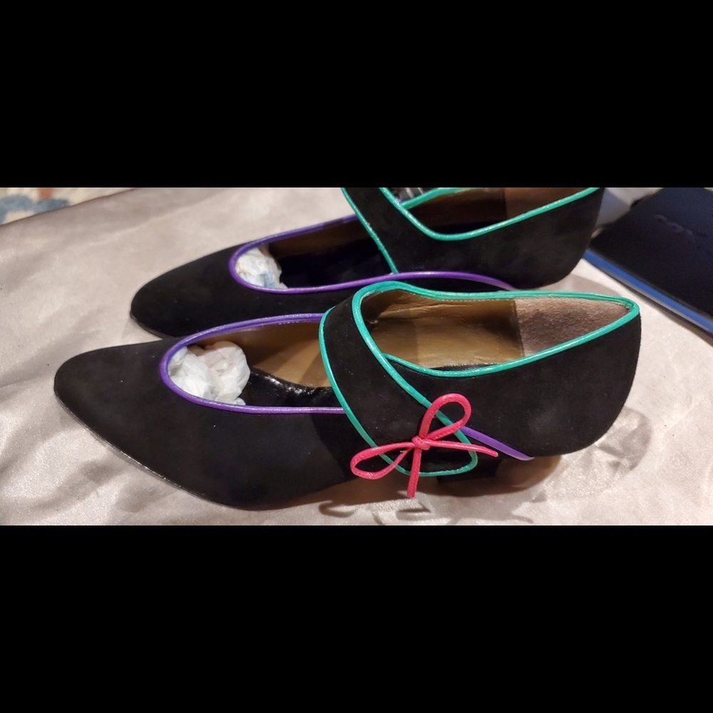 Black Suede with pink, purple, and mint ribbing around strap 7.5 B